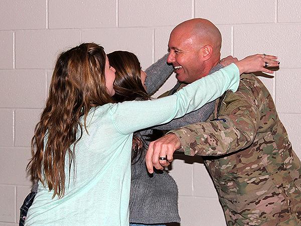 Coming Home: Sisters get the ultimate surprise