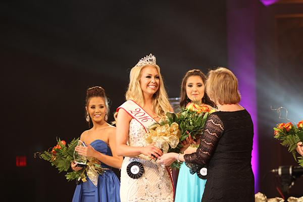 Hanna Carroll is crowned the 2015 Miss Tomball winner. She will help crown the next winner soon.