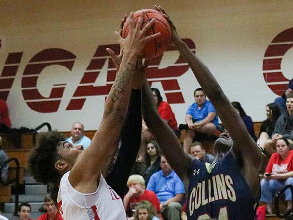 Cougar Basketball mauled by Klen Collins Tigers