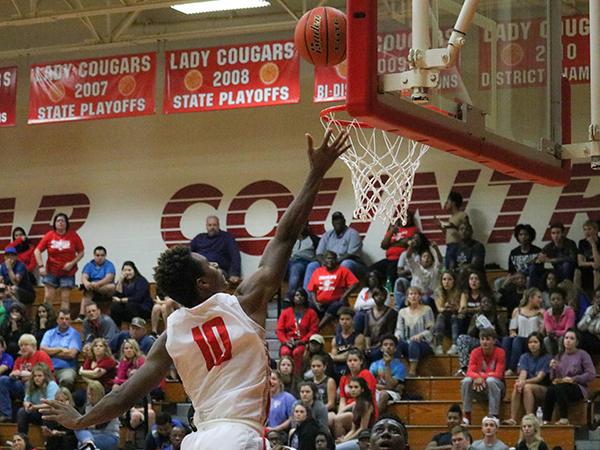 Darius Taylor (12th) making a lay-up