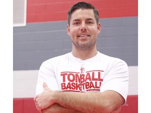 New boys basketball coach takes over with large expectations.