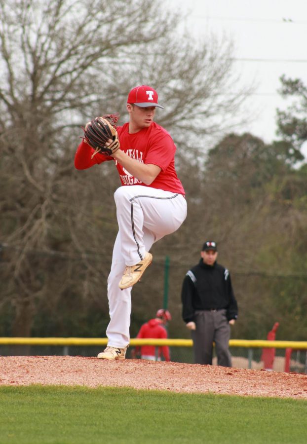 Eric Oakes winds up to pitch; Oakes is one of the top pitchers in the district.