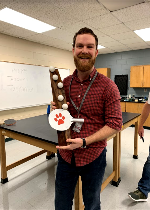 Jay DeCoste with Ping Pong trophy. 