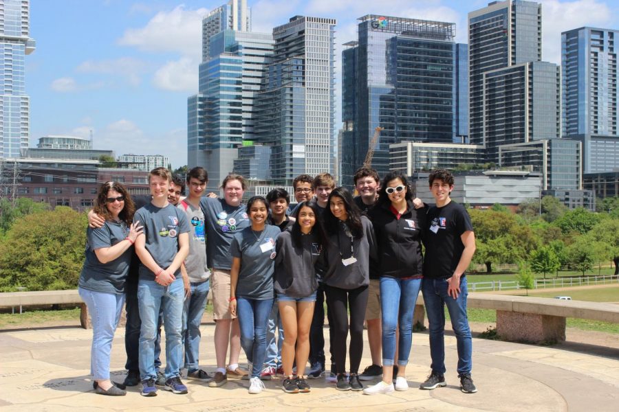 The robotics team takes a moment during a competition in Houston to pose for a team picture.