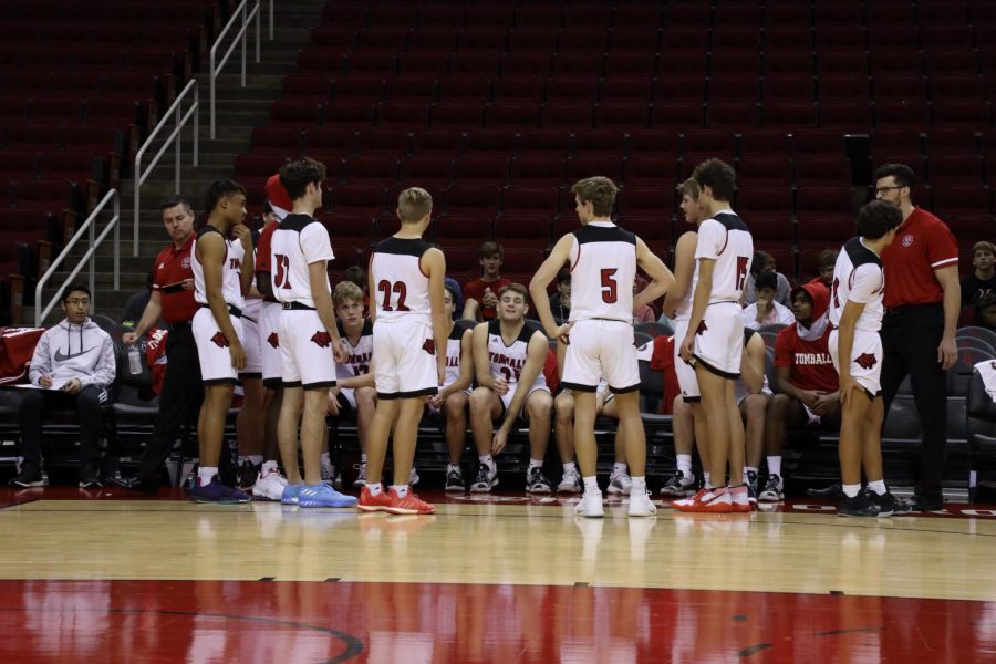 Basketball team during a timeout.