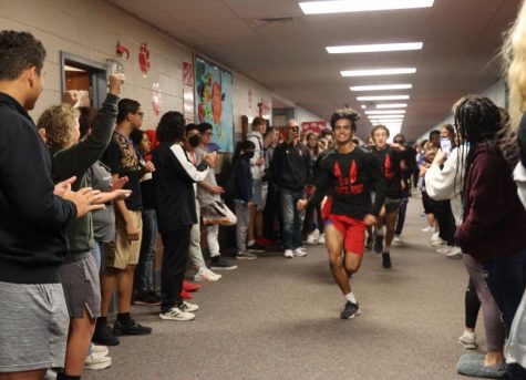 The student body turns out to cheer on the cross country team Friday as they head to state.