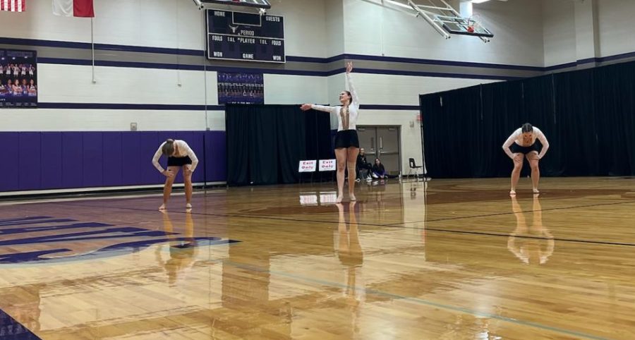 Ciana Shafer, Major Hayleigh Lear, and Lieutenant Jaysee Pledger perform their 1st place Officer Open dance together.