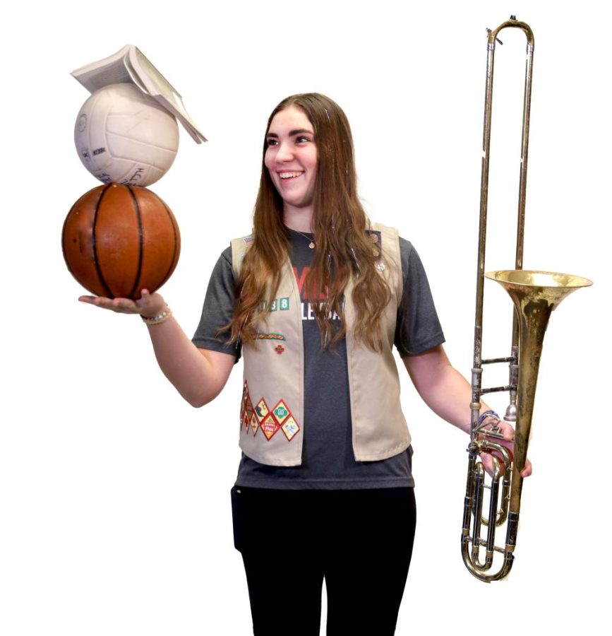Amelie Grostabussiat balances academics, band, sports and Scouts in a busy juggling act.