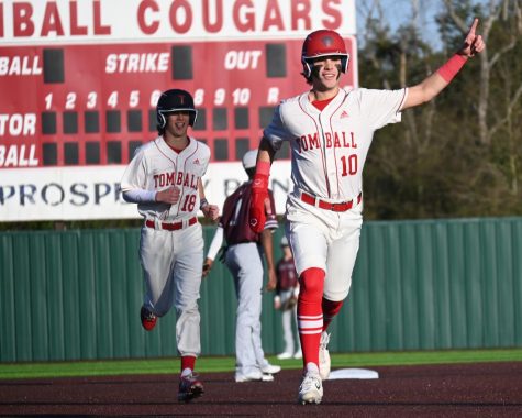 The Cougars celebrate a home run during their game against Morton Ranch earlier this season.