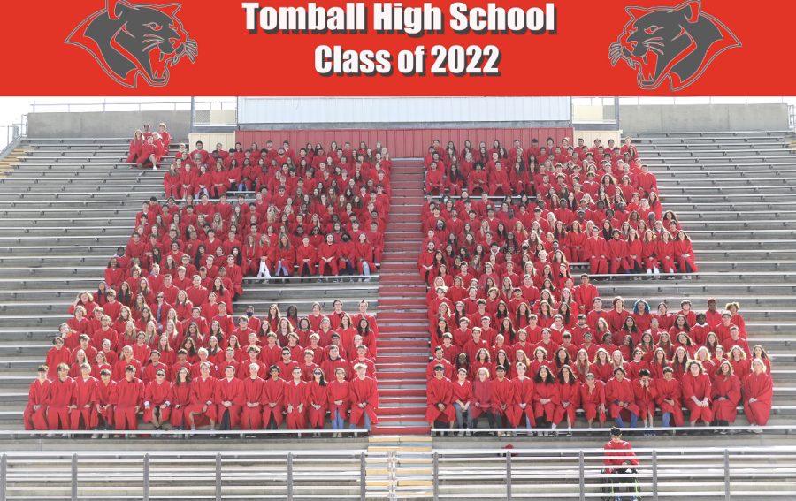 The+class+of+2022+sits+together+in+the+Cougar+Stadium+for+their+class+picture.