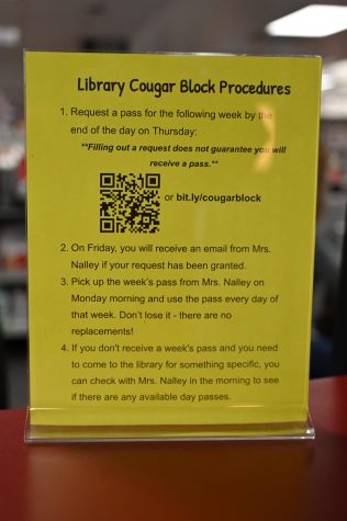 A new sign explains the rules for visiting the library during Cougar Block.