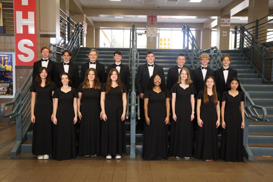 Velasquez (left) and Chad (right) pose for choir group photo