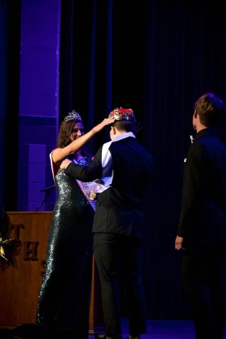 The crown is presented to the new Mr. Debonair.