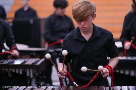 Sophomore Braden Soetart Performing Part 2 with his hands tangled up