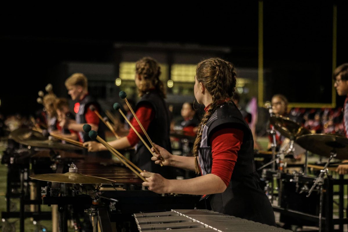 The percussion group during the marching season performing their show for the fall season. 