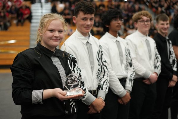 JV Indoor Percussion posing with their trophy at the Pasadena Memorial Contest