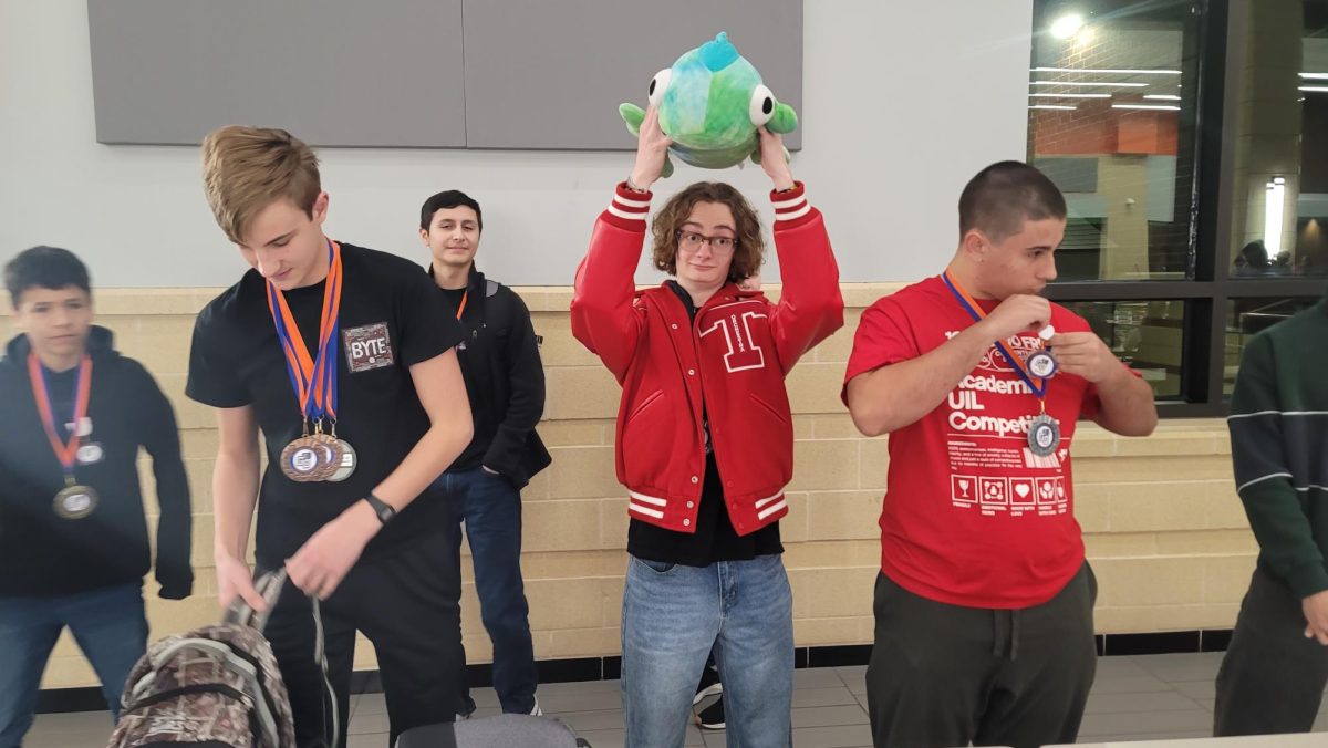 Members of the Computer Science UIL celebrate their success at the Grand Oaks tournament.