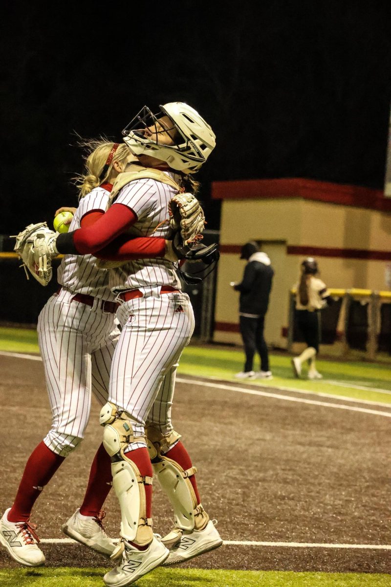 Kayle Awall celebrating striking out Mag West batter for final out in win