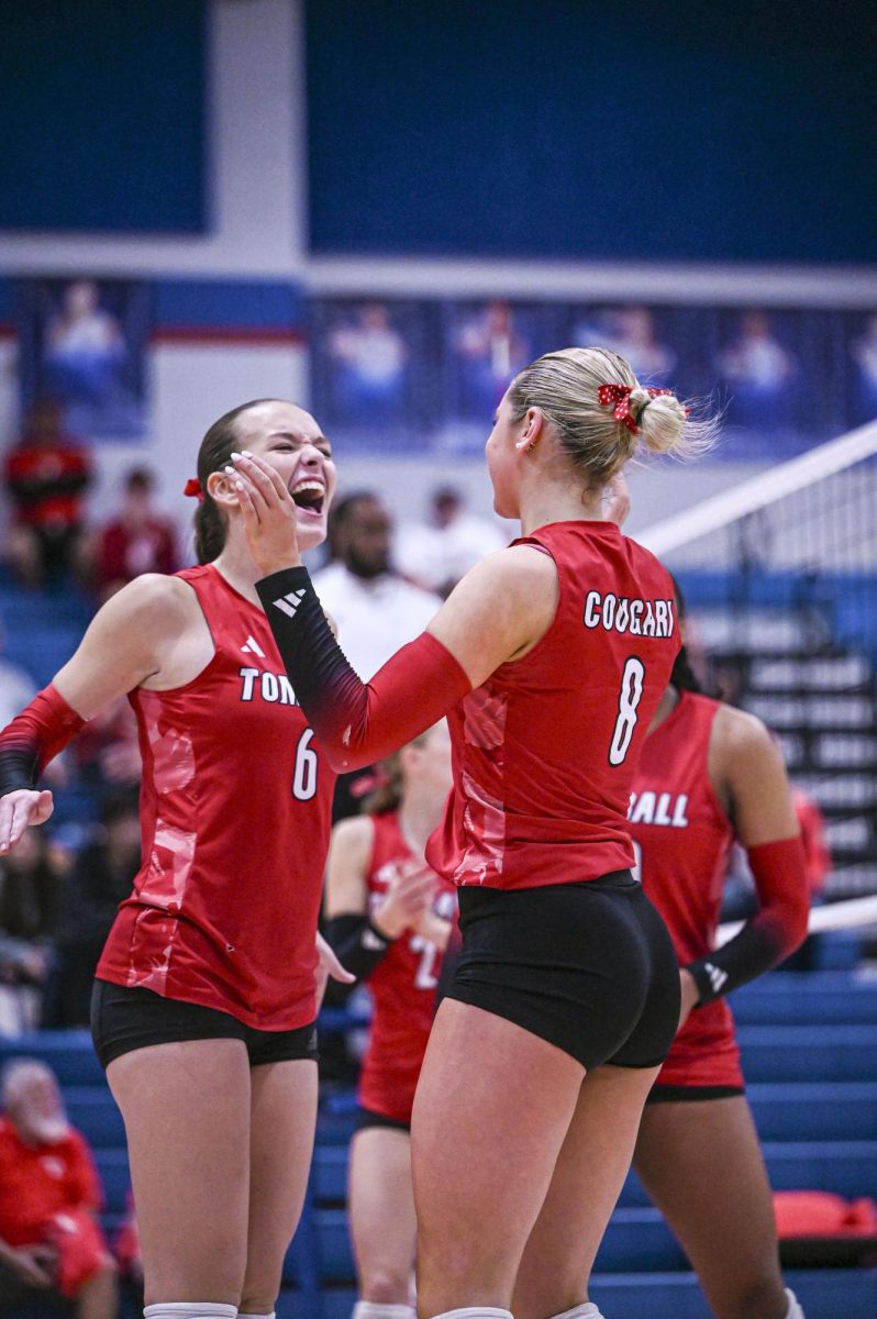 Coogs celebrate after scoring a point in the regional final. 